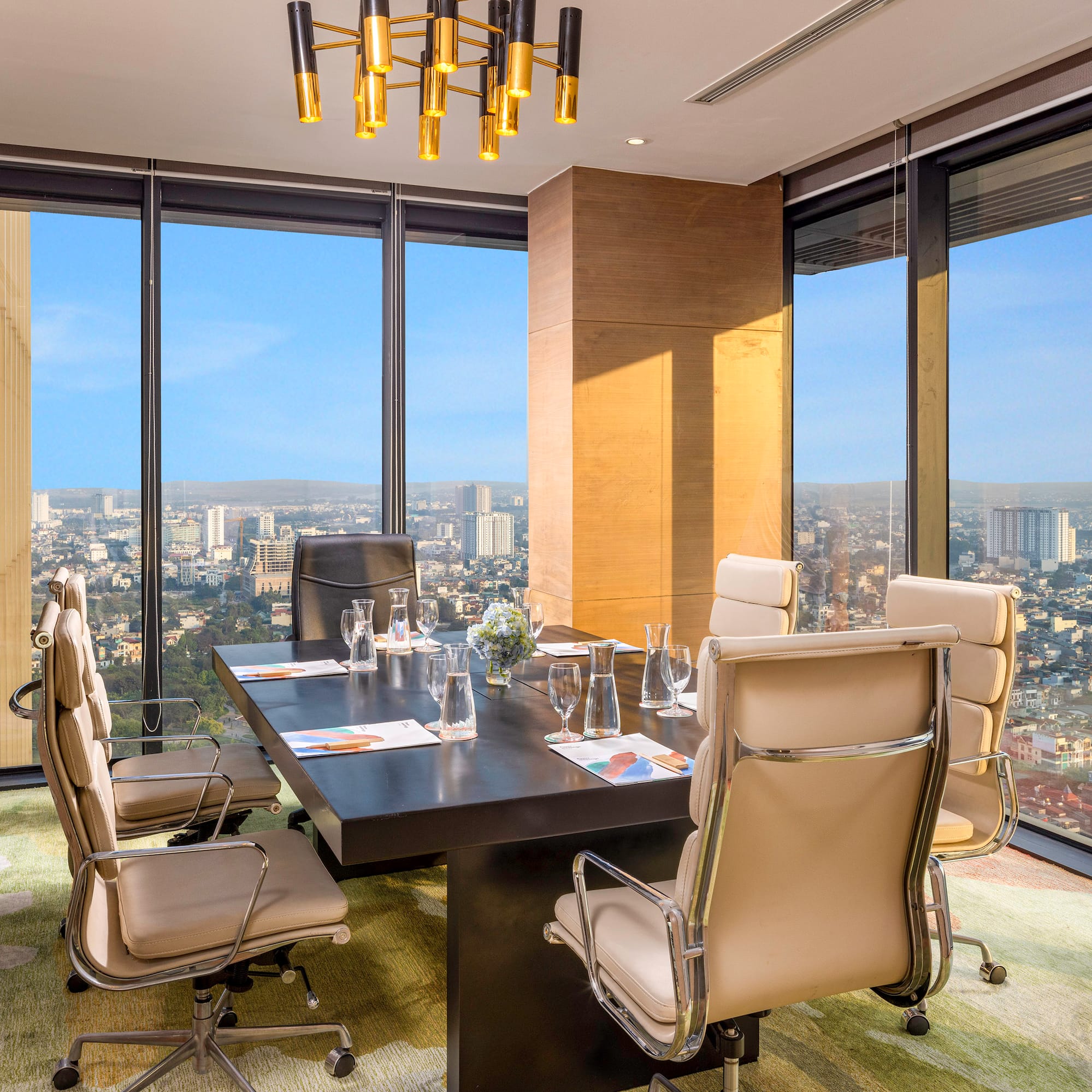 a conference room with a table and chairs