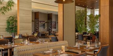 a restaurant with tables and chairs