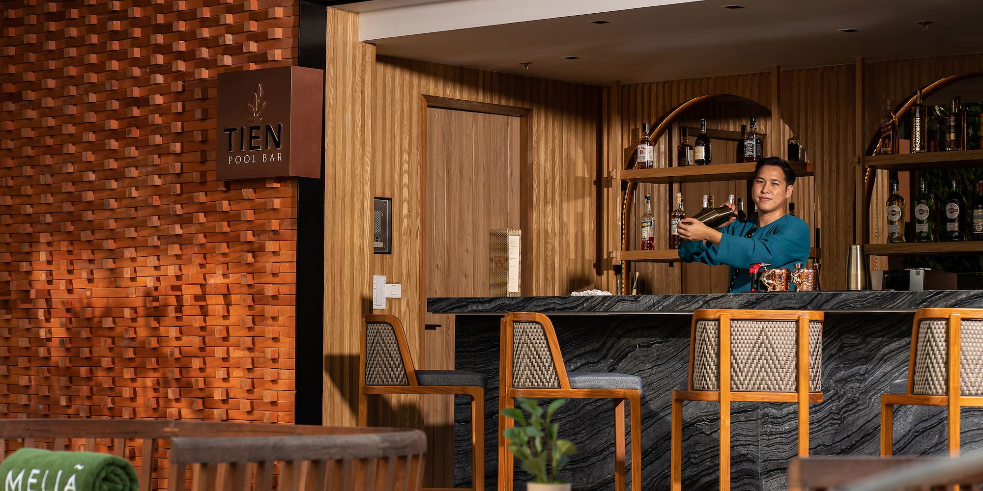 a man standing at a bar