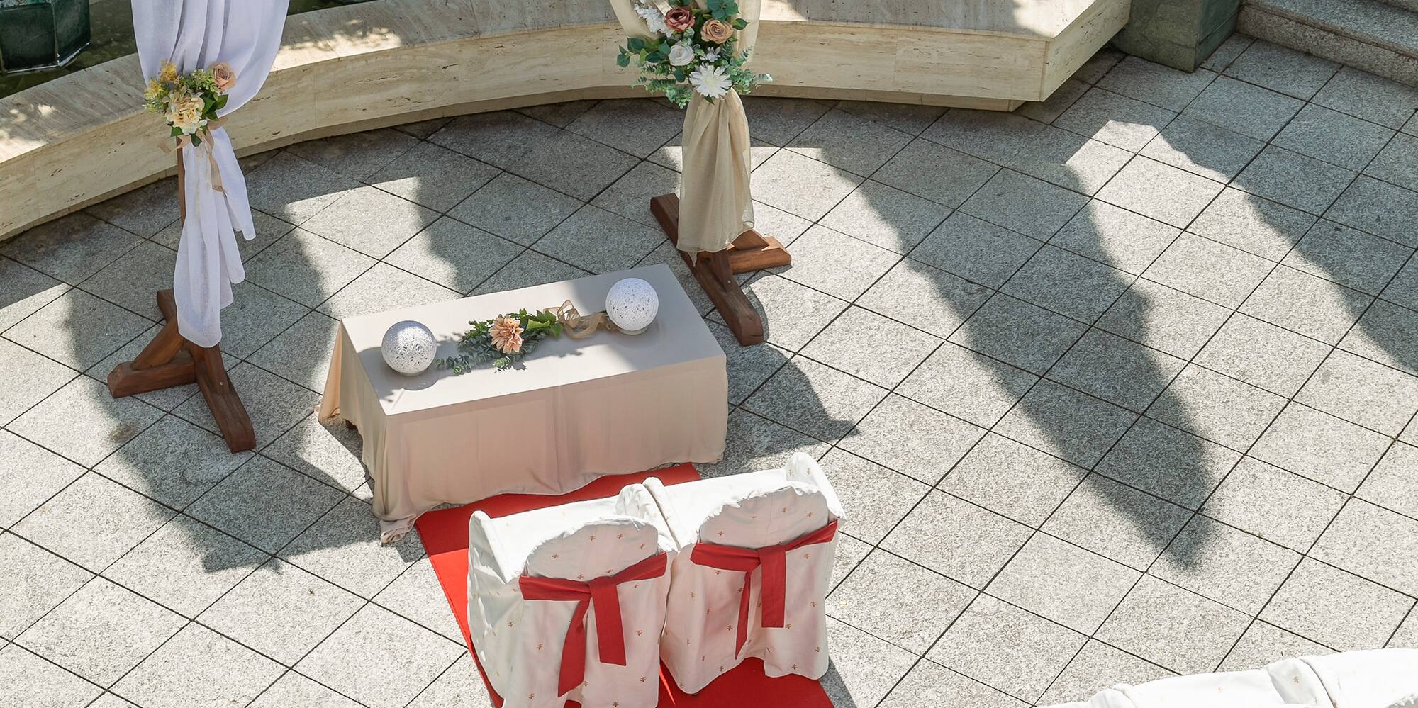 an outdoor setting with chairs and tables