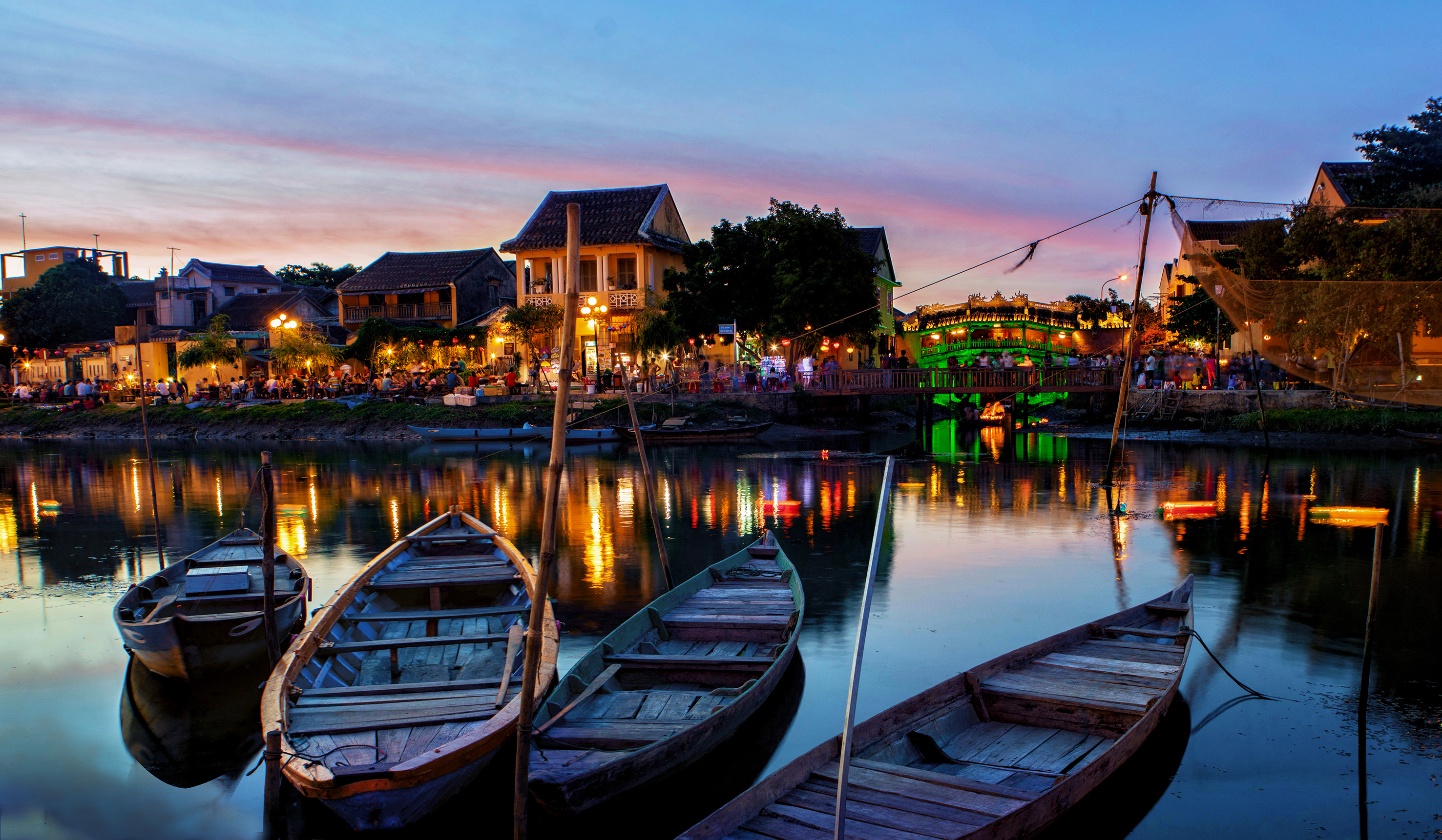 boats on the water at night