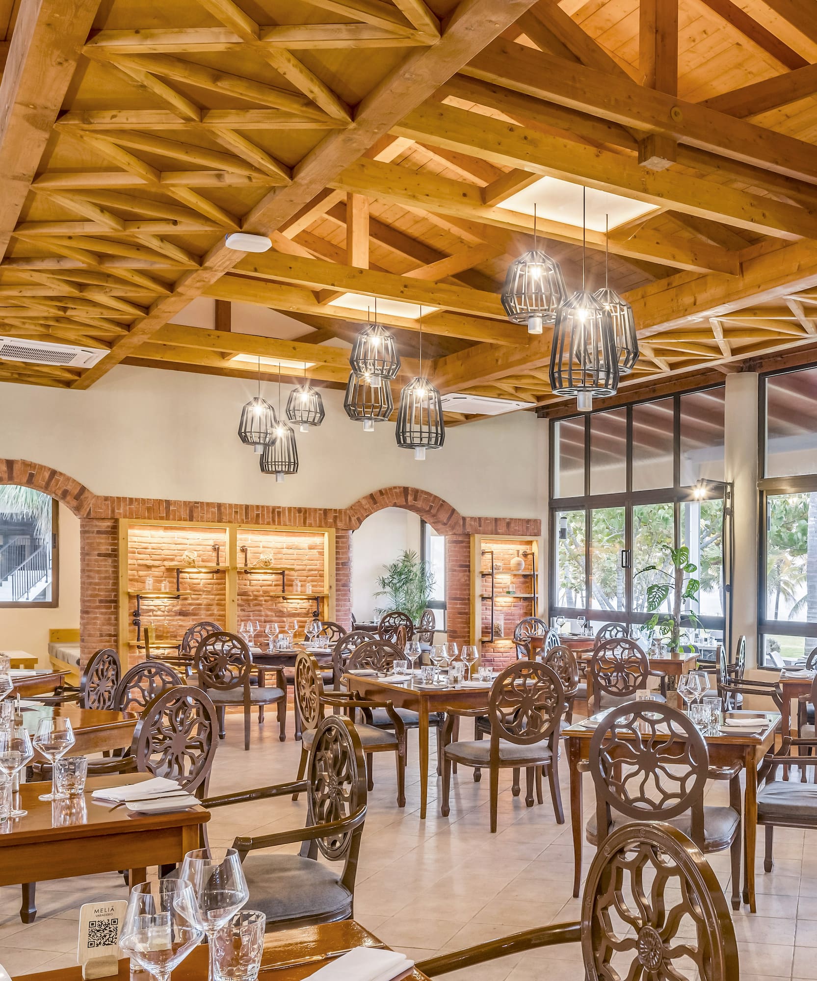 a room with tables and chairs