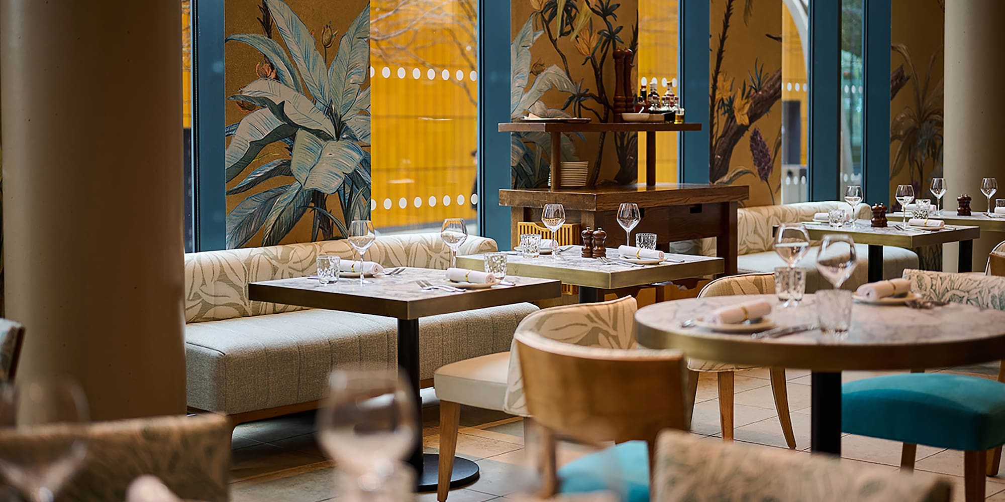 a restaurant with tables and chairs