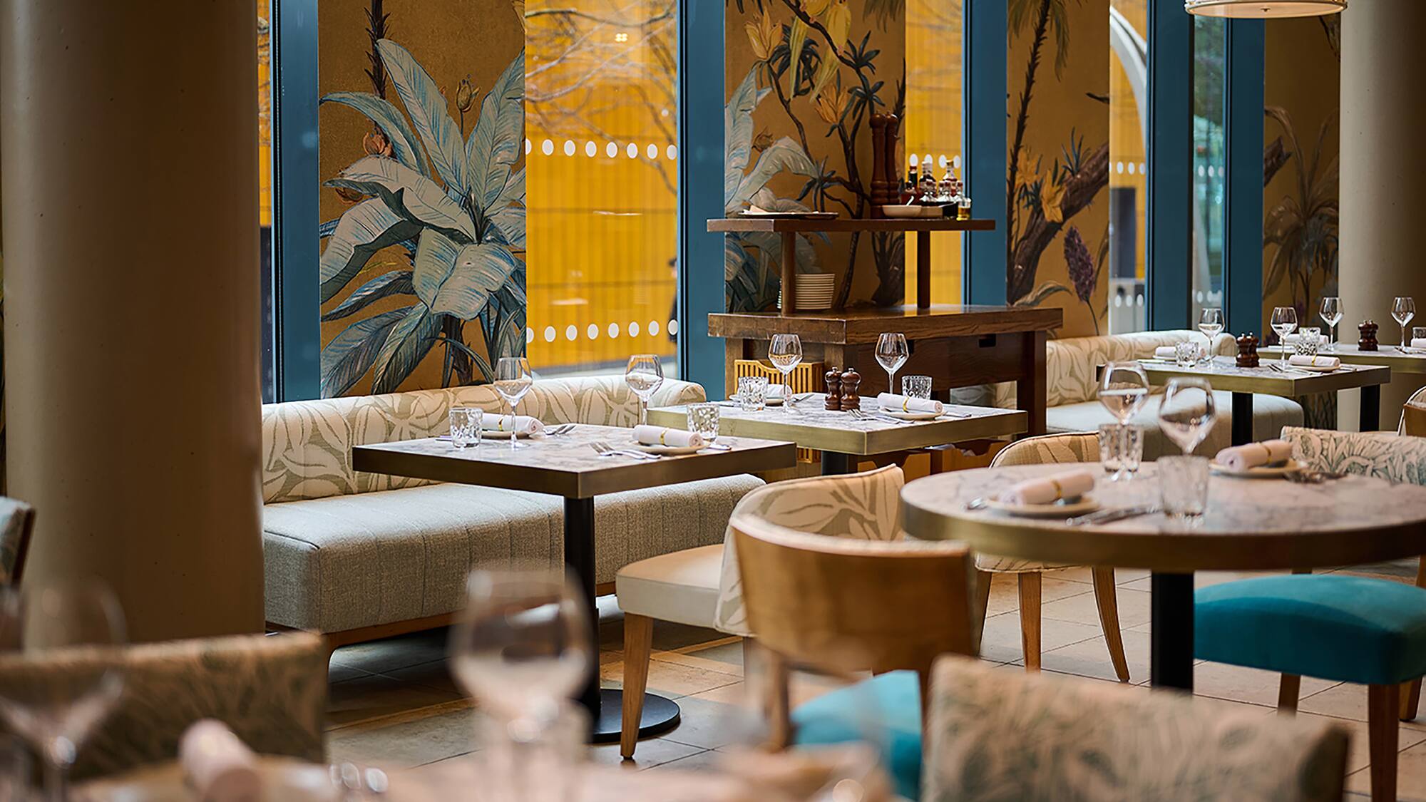 a restaurant with tables and chairs