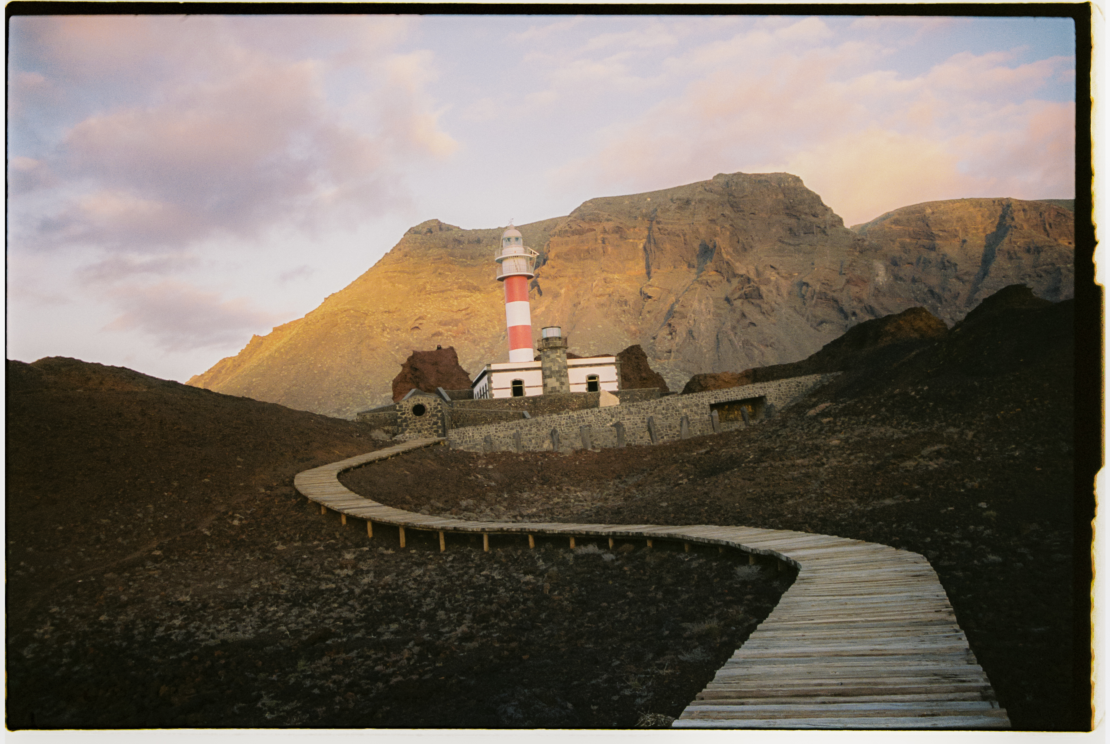 a path leading to a lighthouse