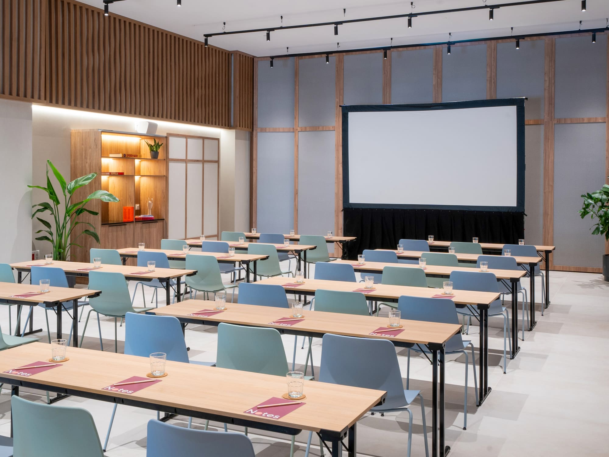 a room with tables and chairs