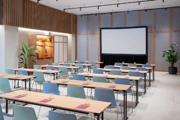 a room with tables and chairs