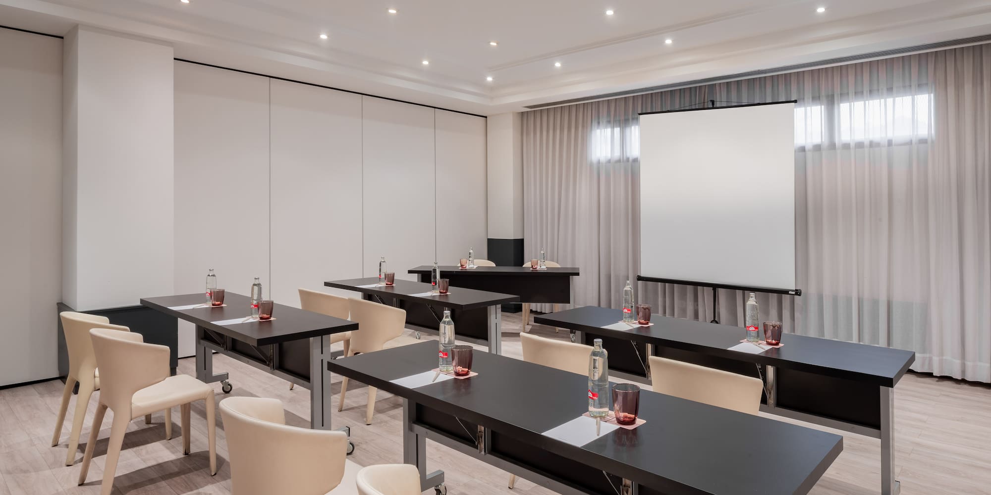 a room with tables and chairs