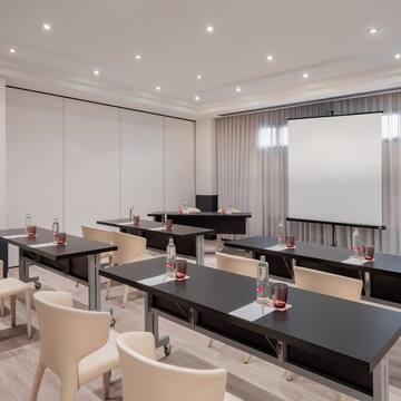 a room with tables and chairs