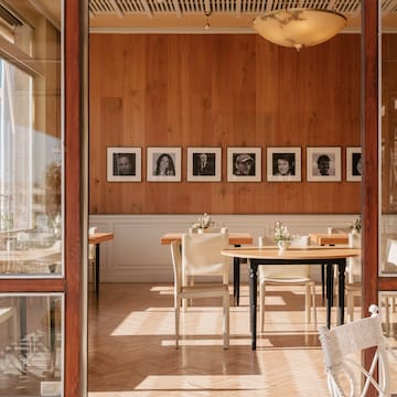 a room with a table and chairs