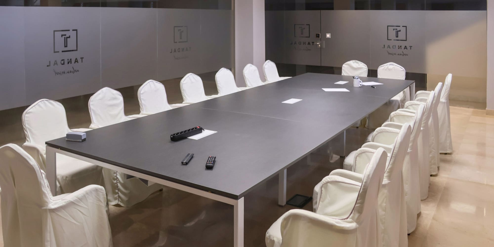 a conference room with chairs and a table