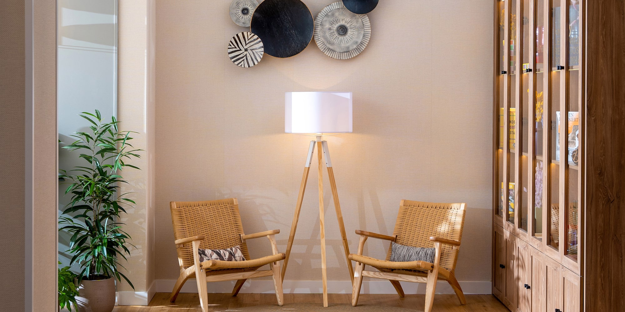 a room with two chairs and a lamp