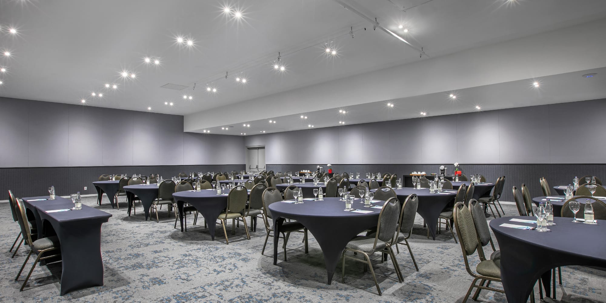 a room with tables and chairs