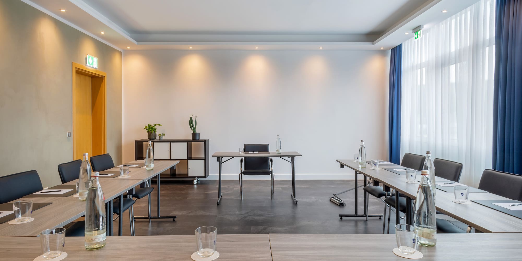 a room with tables and chairs