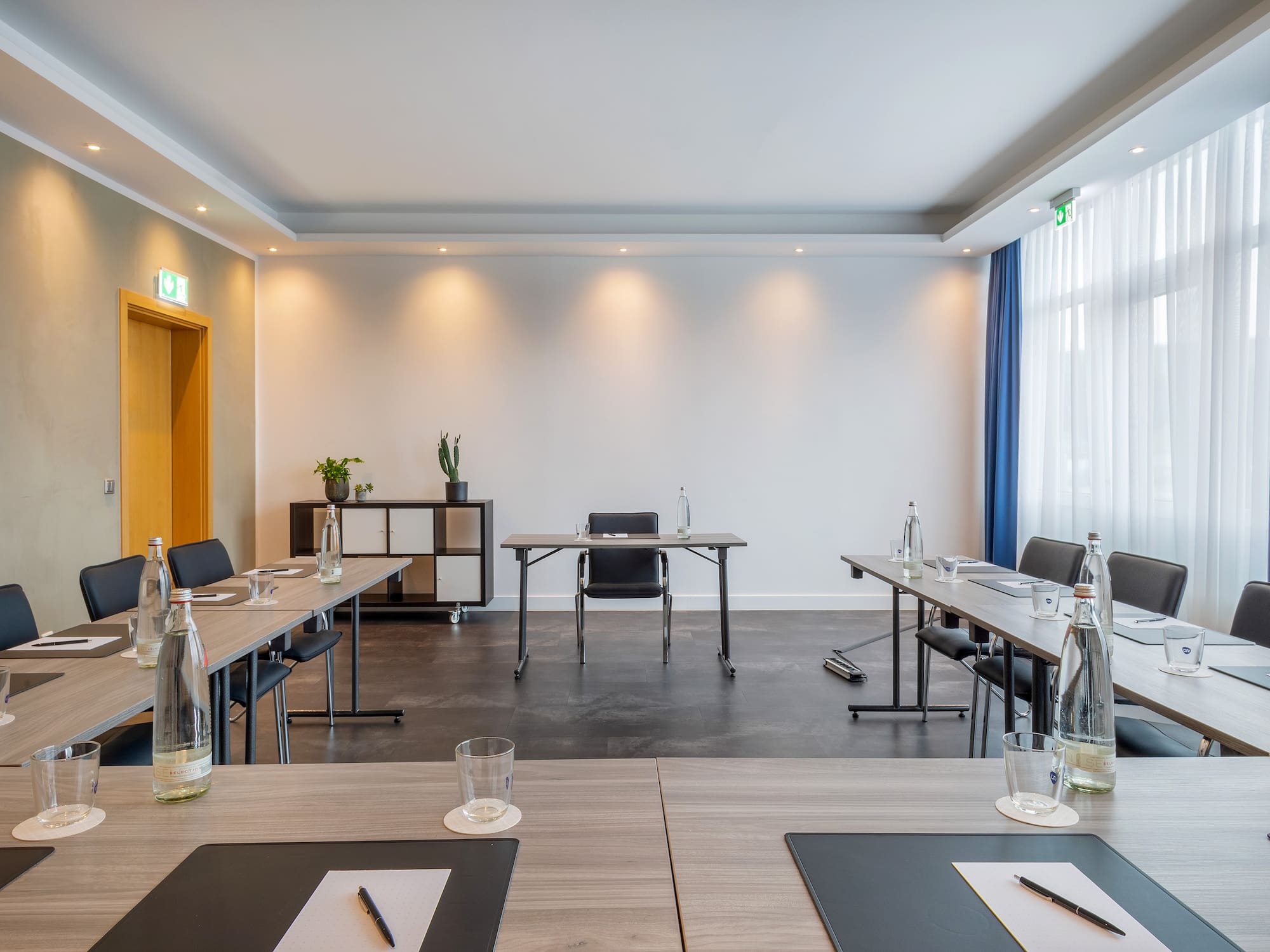 a room with tables and chairs