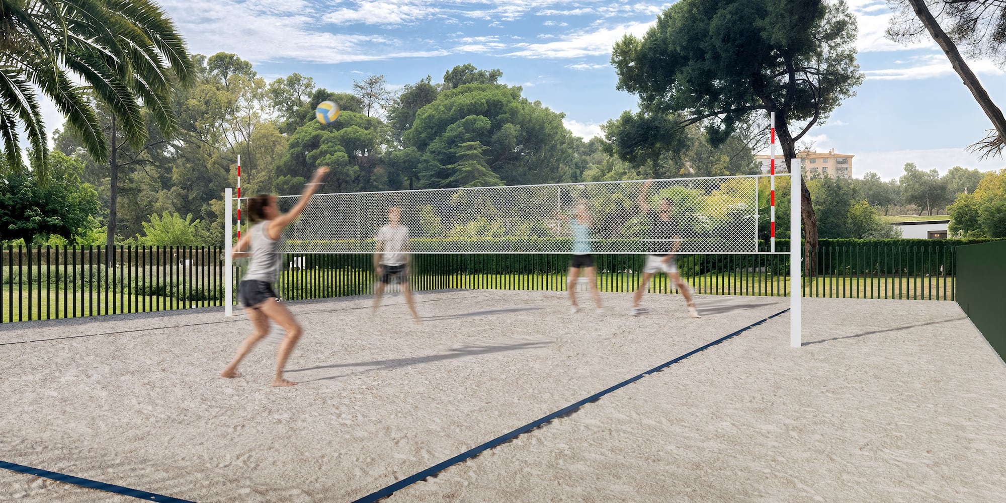 a group of people playing volleyball