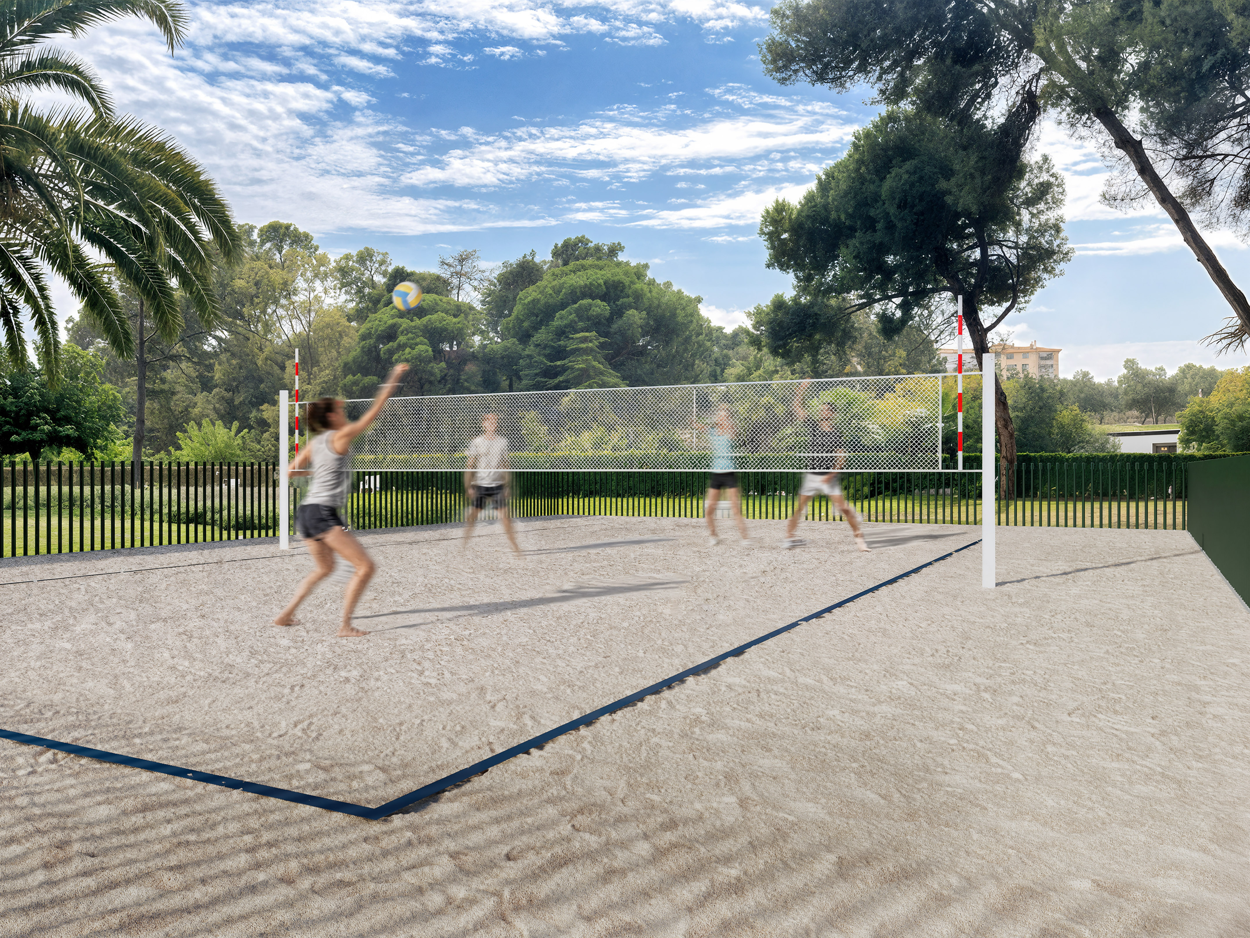 People playing beach volleyball on a sand court under a sunny sky.