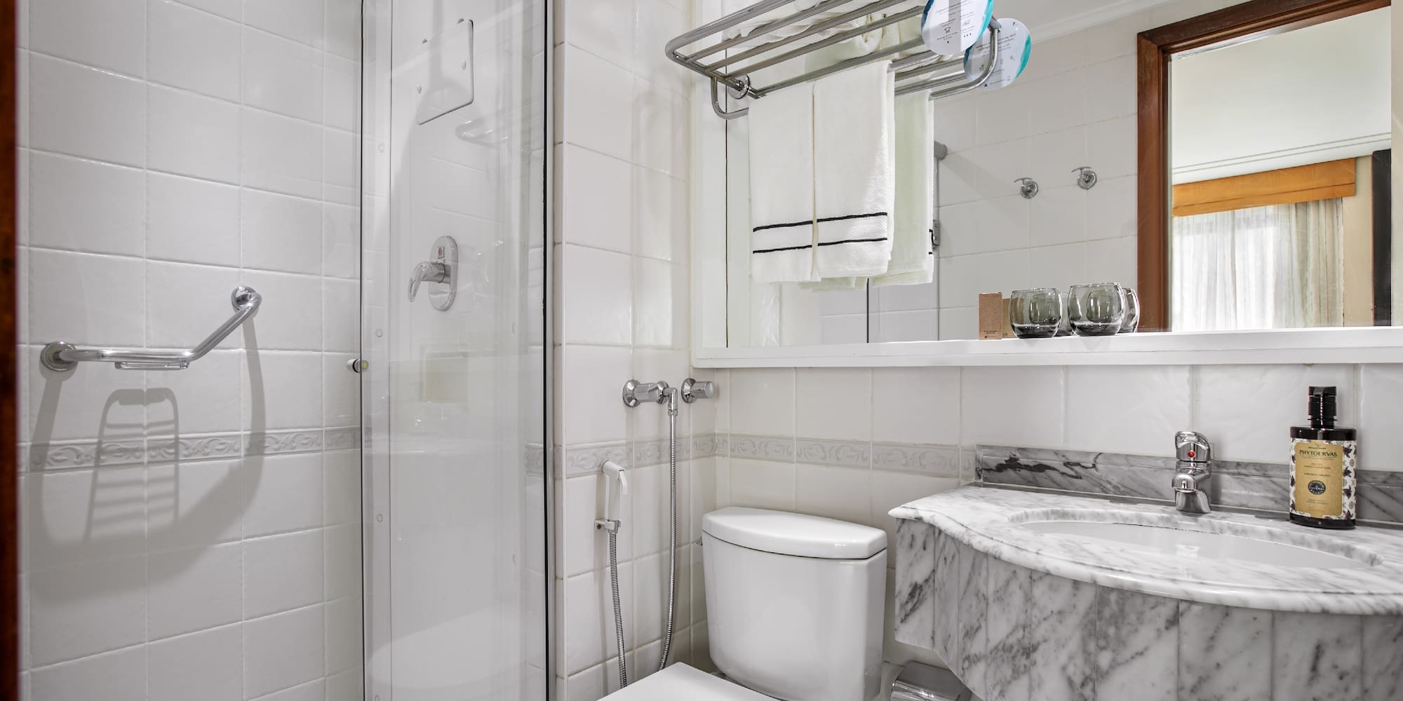 a bathroom with a sink and toilet