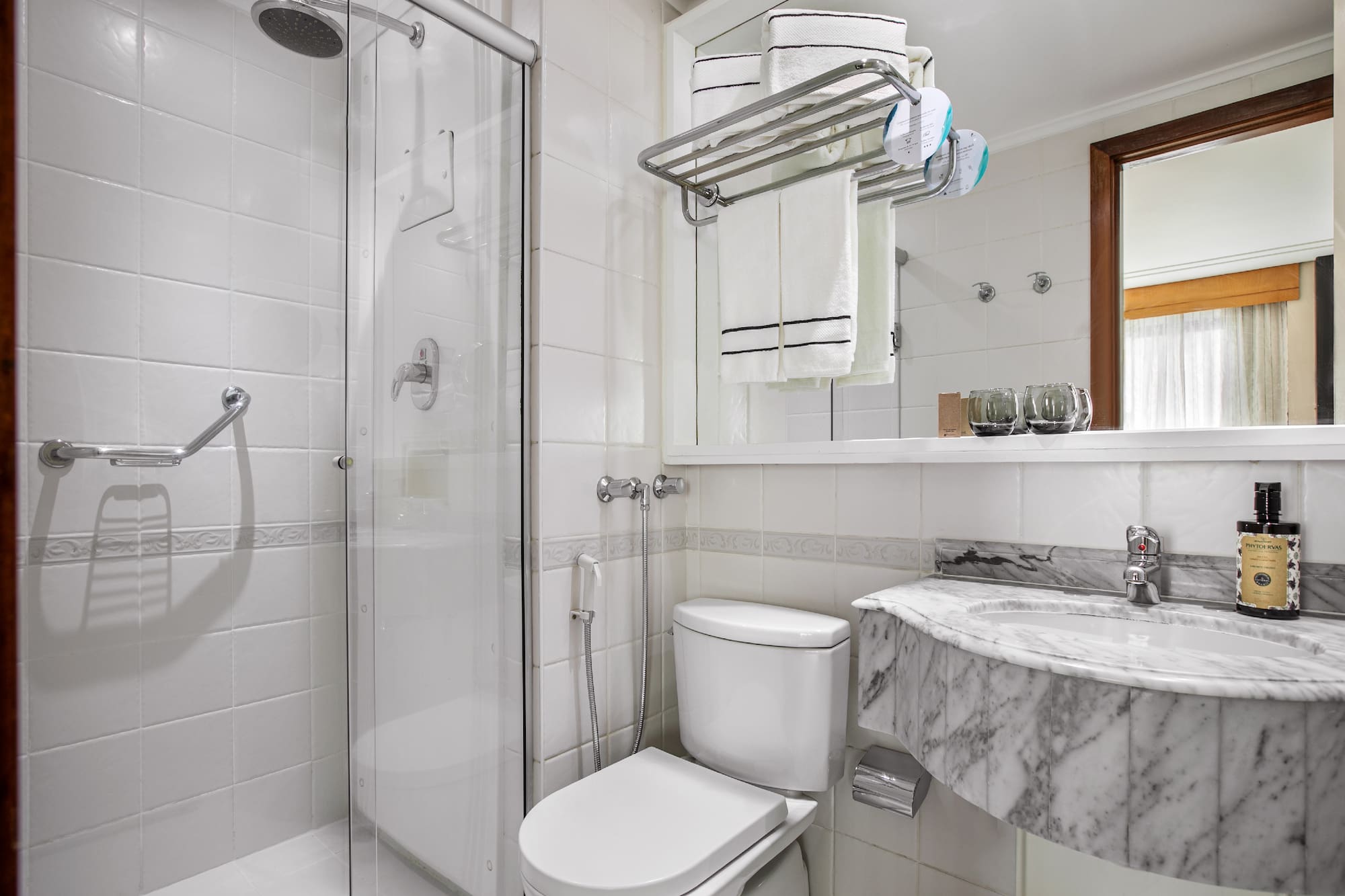 a bathroom with a sink and toilet