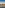 Vienna Donaucity skyline across Danube river with autumn trees and modern buildings.
