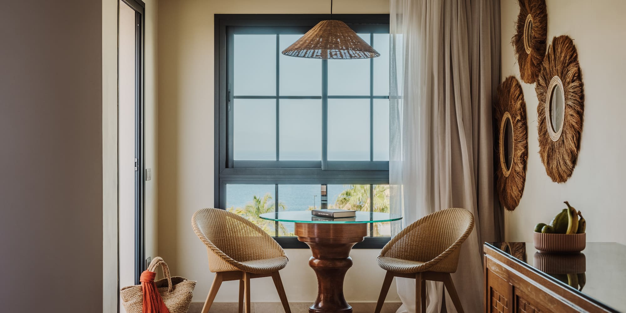 a room with a table and chairs