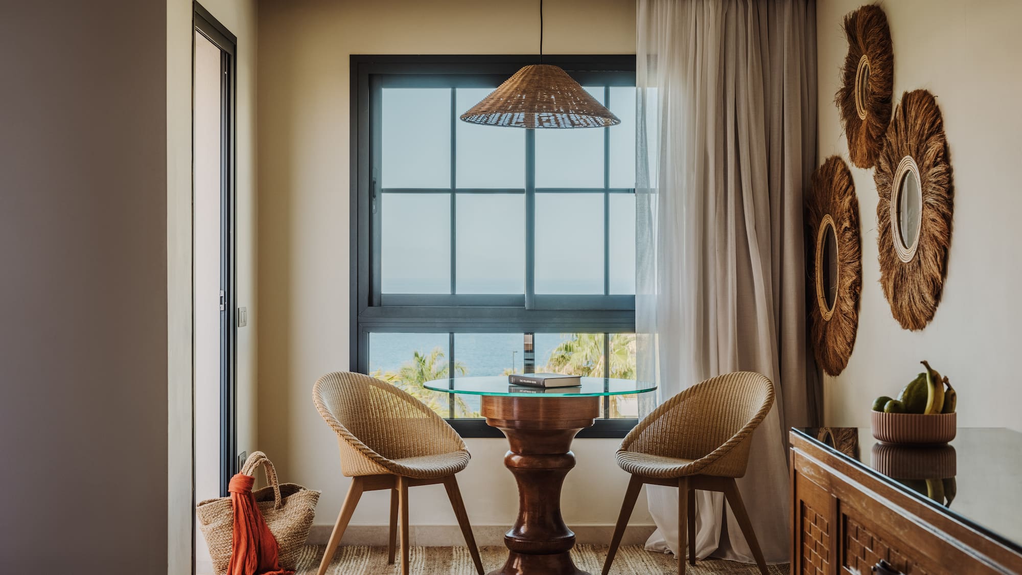 a room with a table and chairs