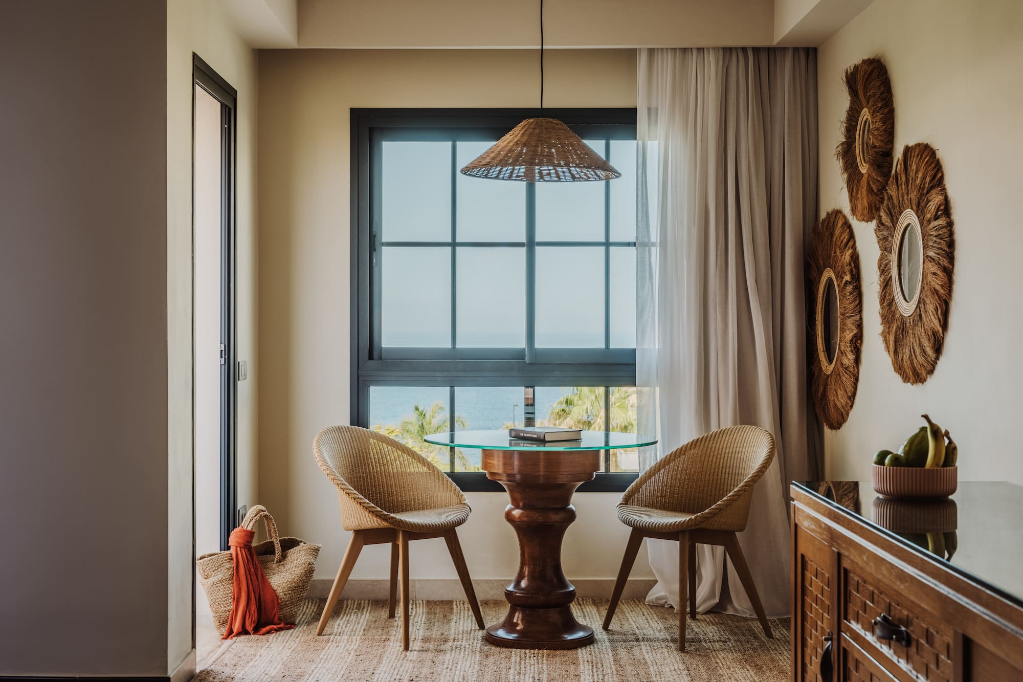 a room with a table and chairs