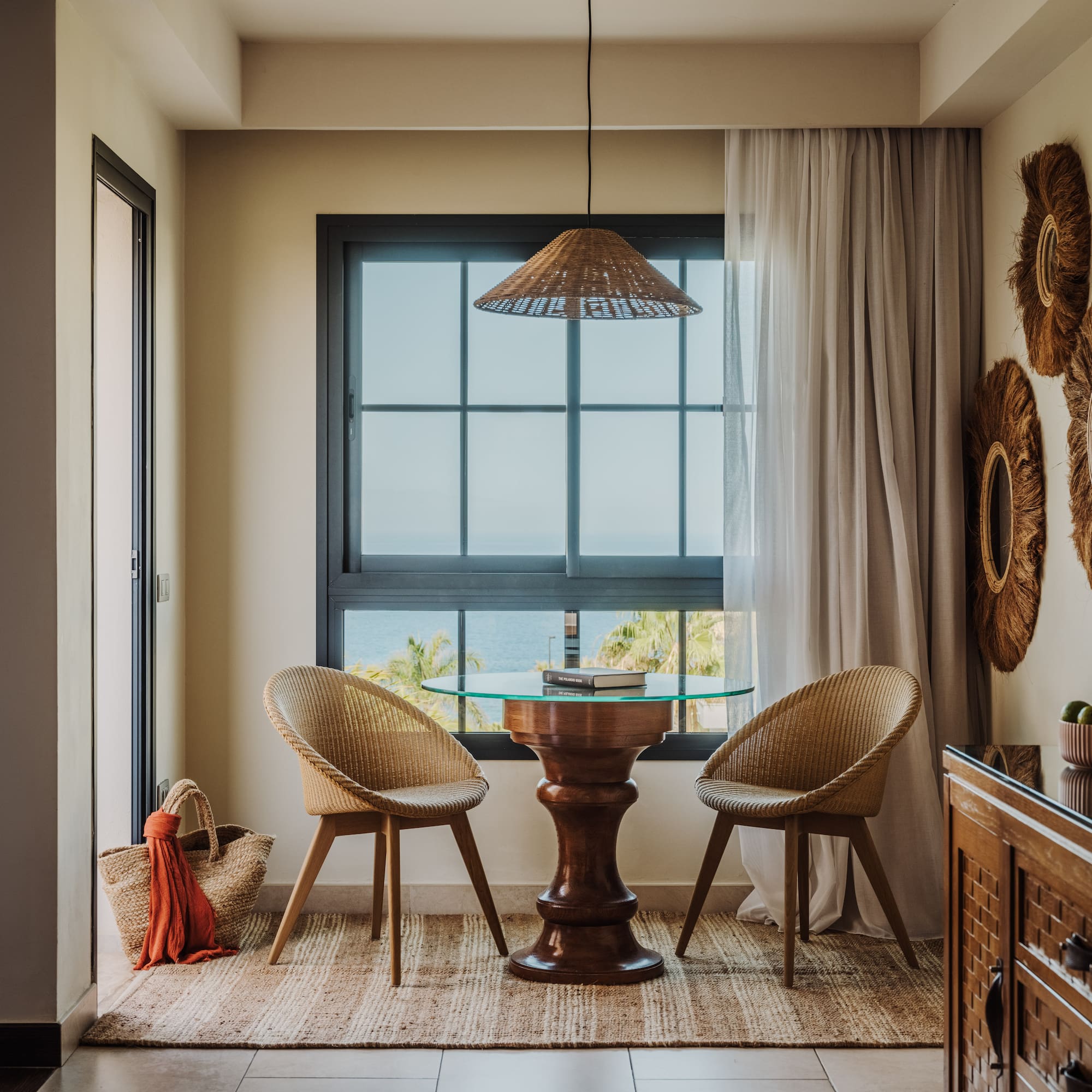 a room with a table and chairs