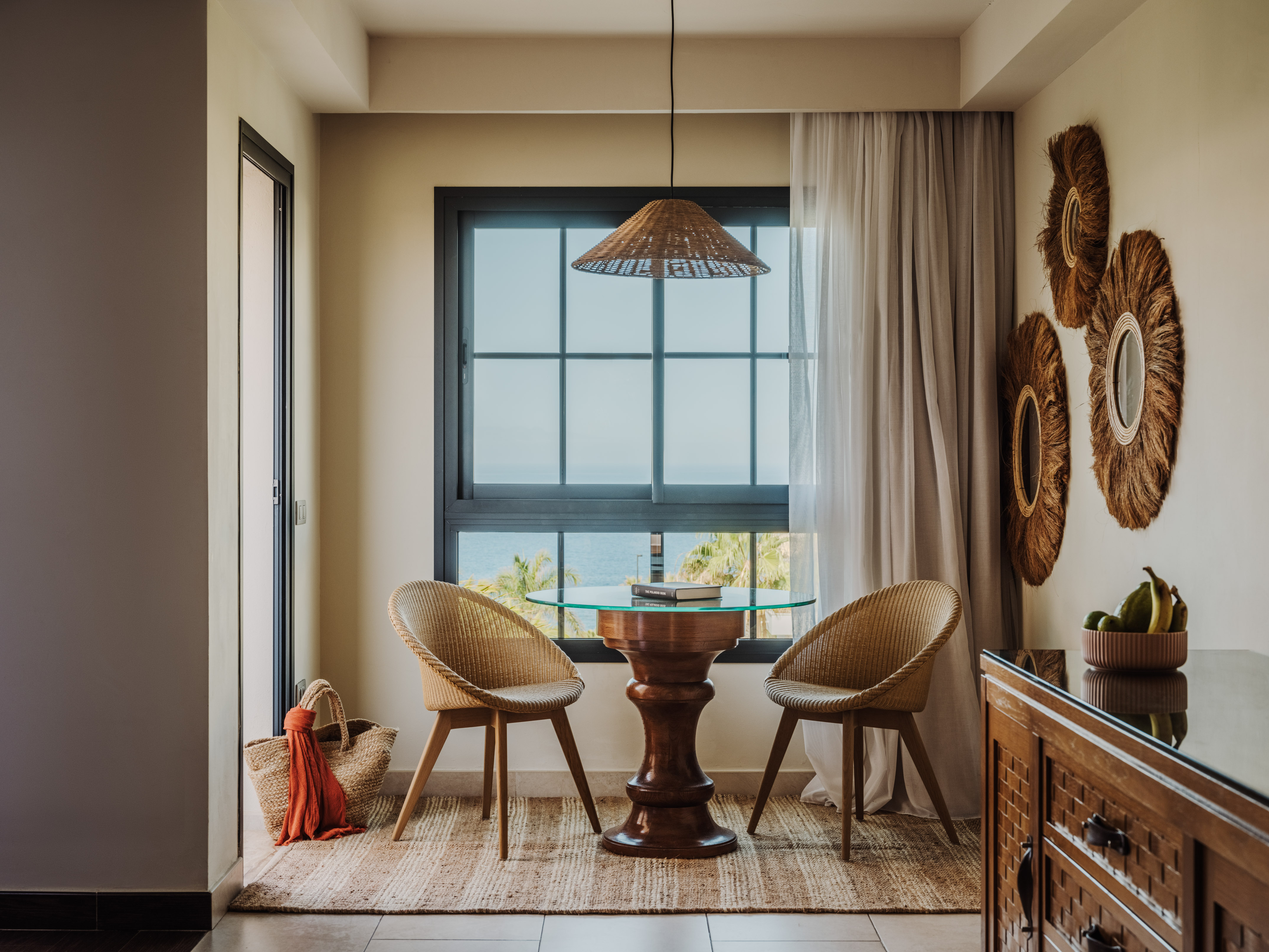 a room with a table and chairs