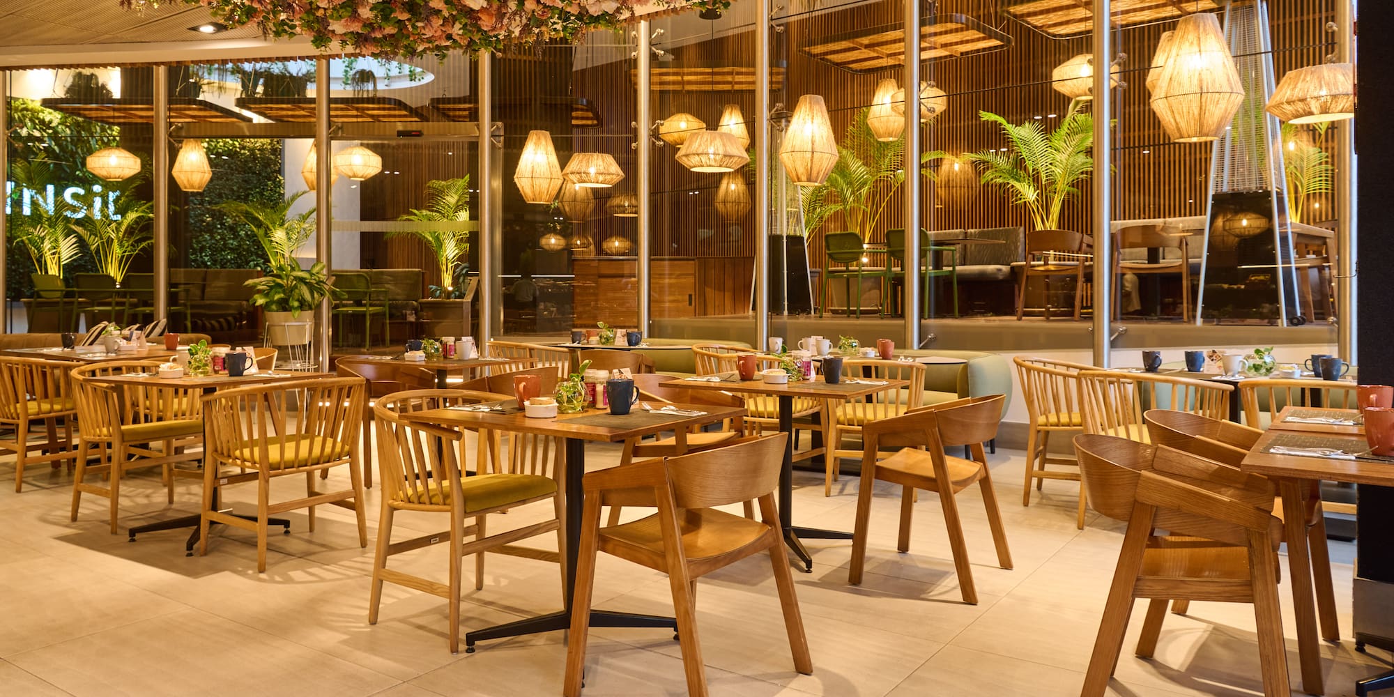 a restaurant with tables and chairs