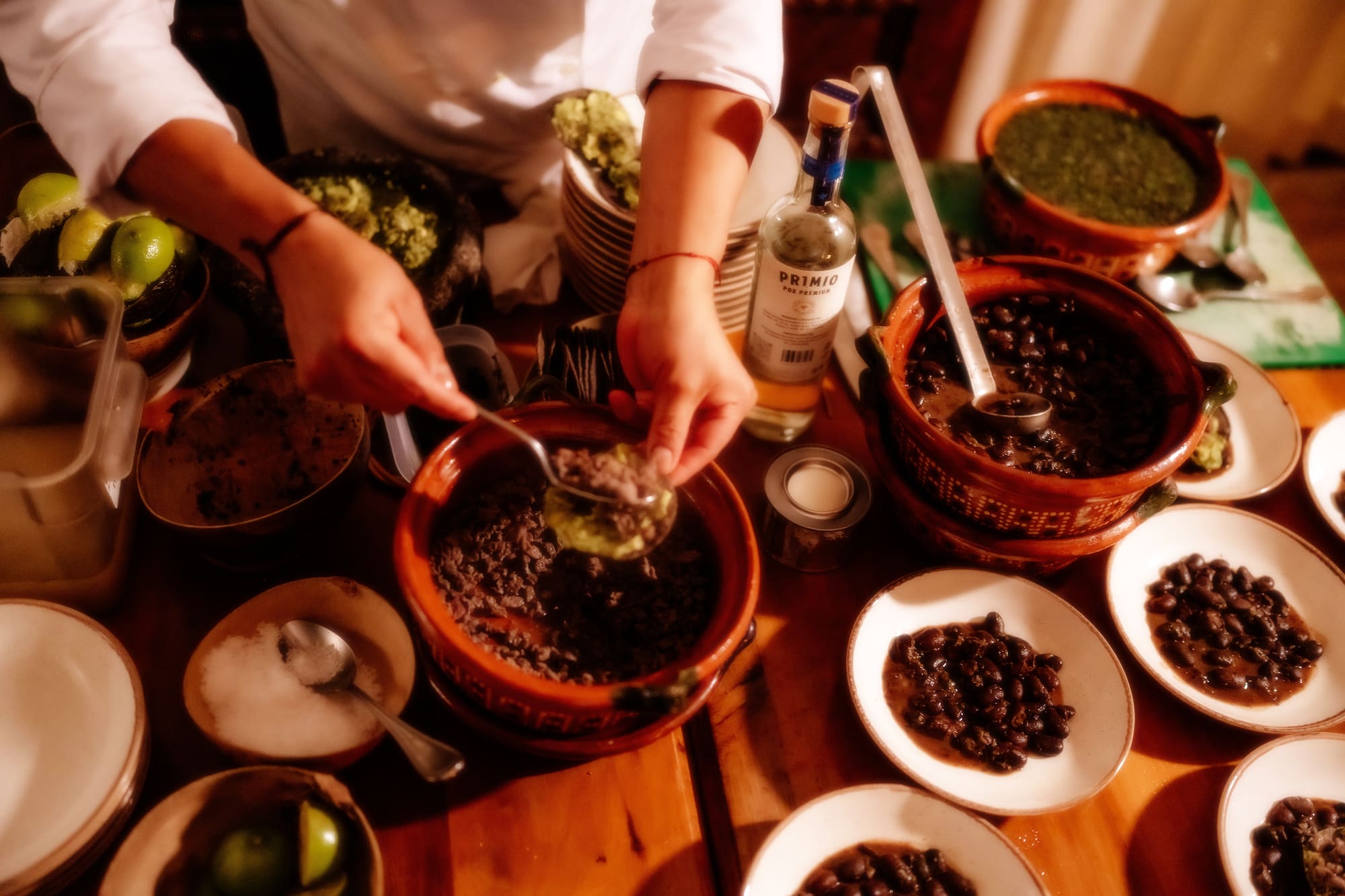 a person mixing food in bowls
