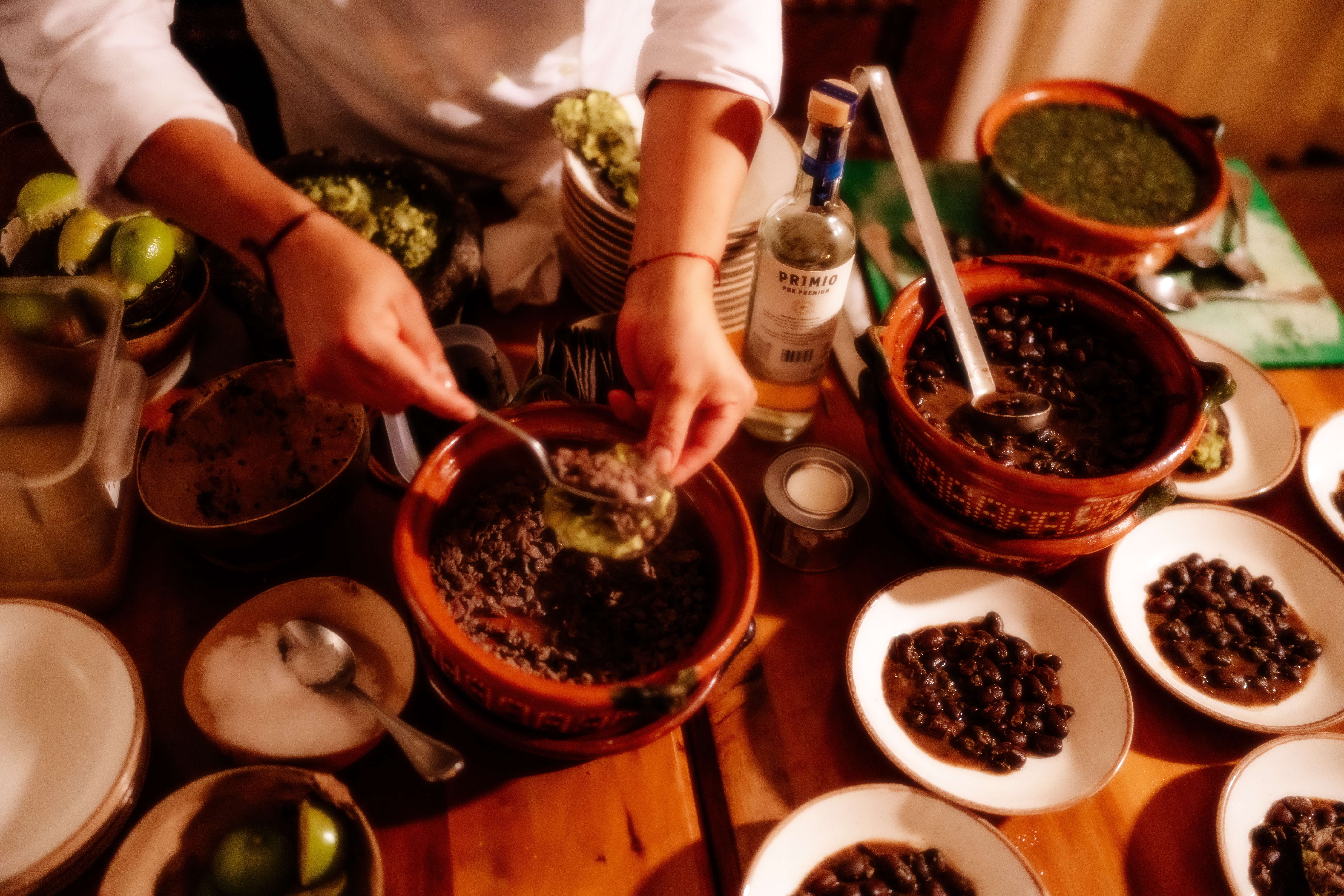a person mixing food in bowls
