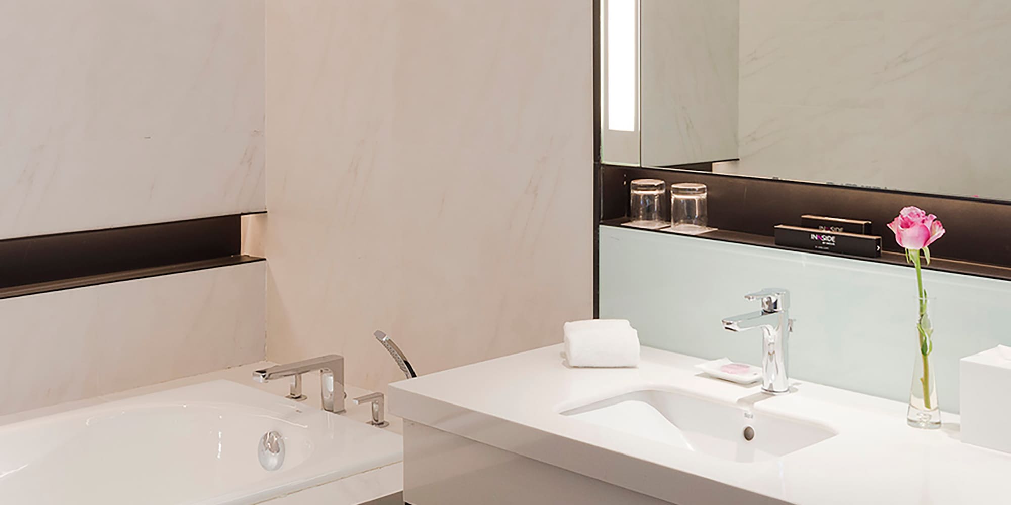 a bathroom with a sink and bathtub