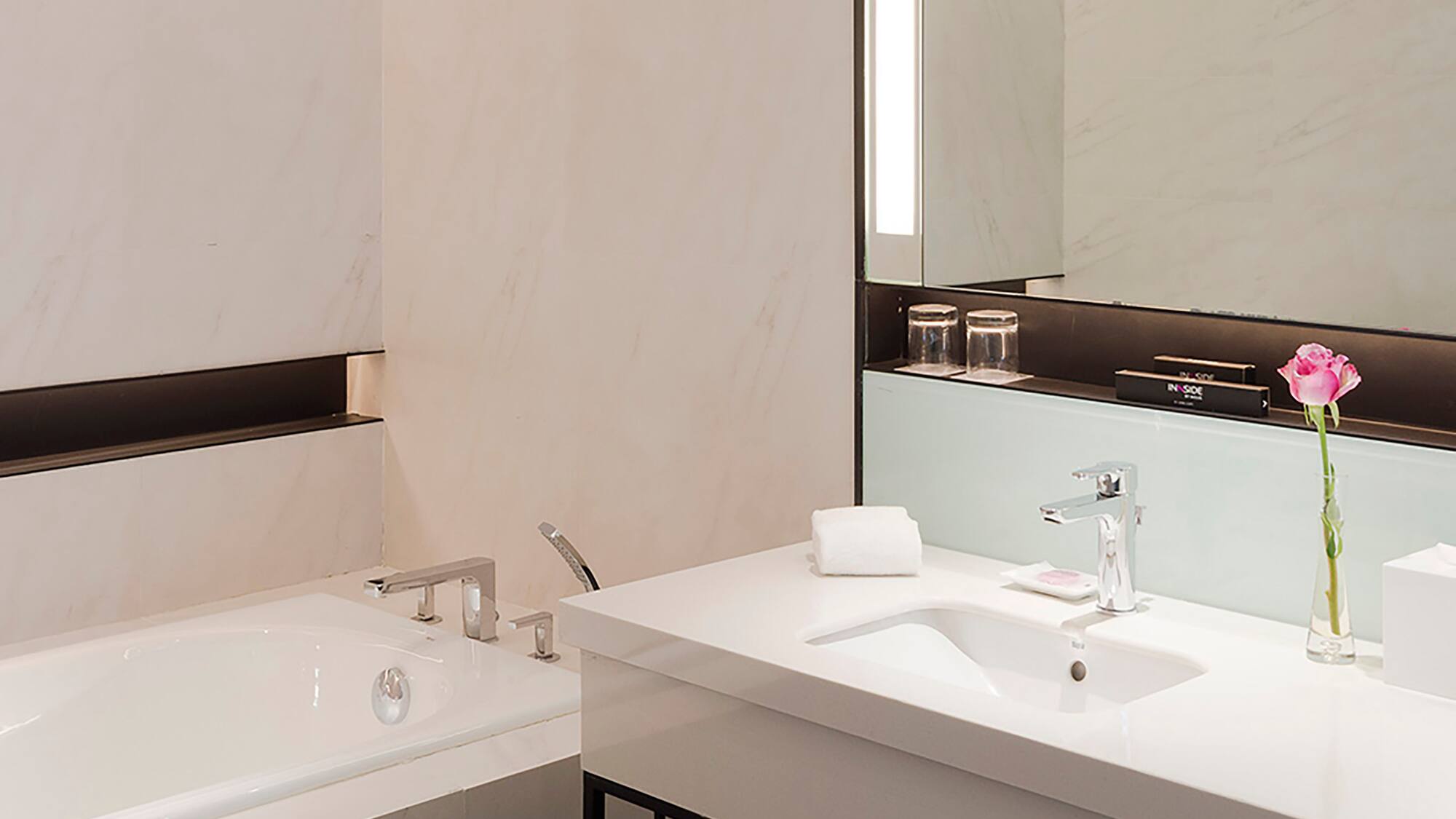 a bathroom with a sink and bathtub