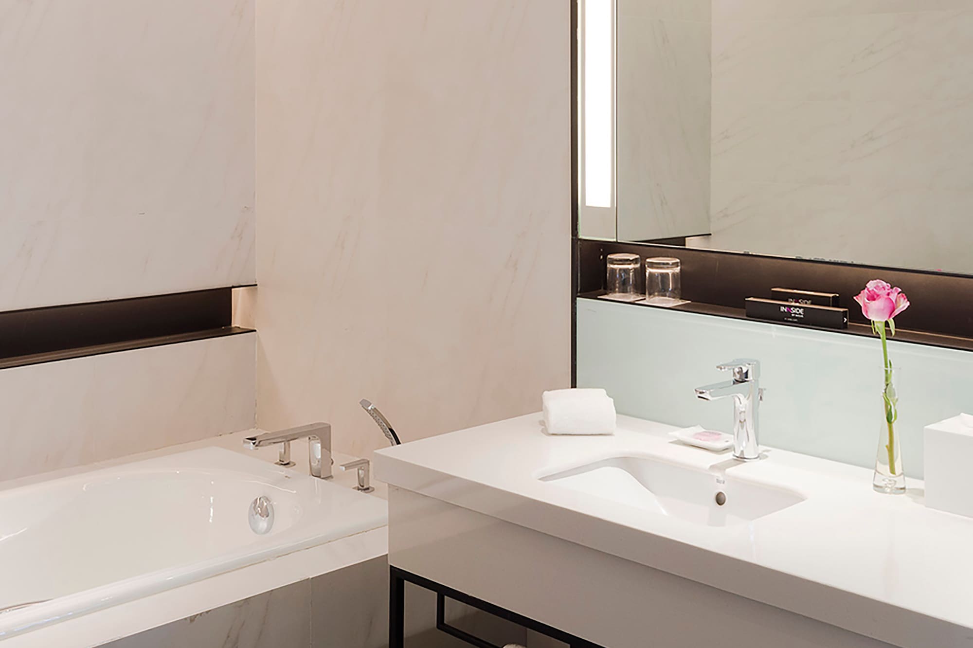 a bathroom with a sink and bathtub