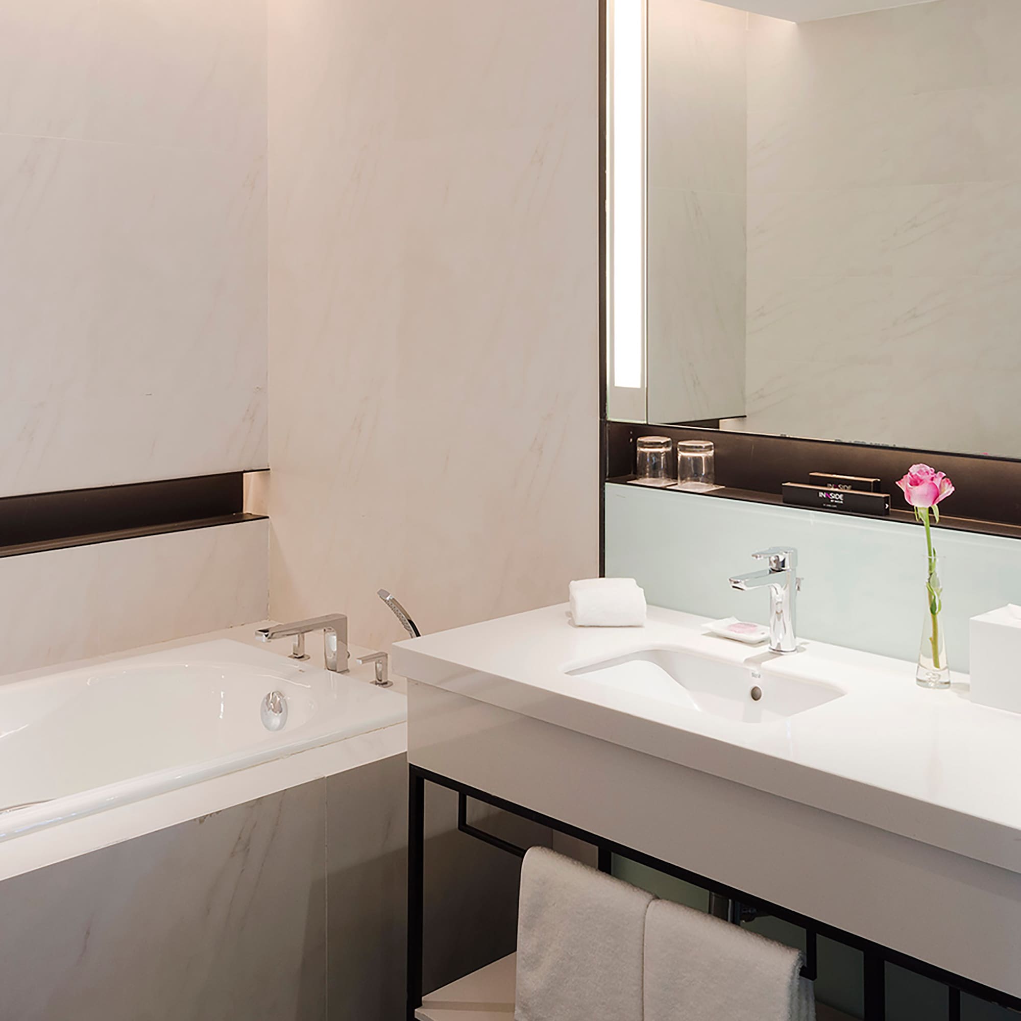 a bathroom with a sink and bathtub