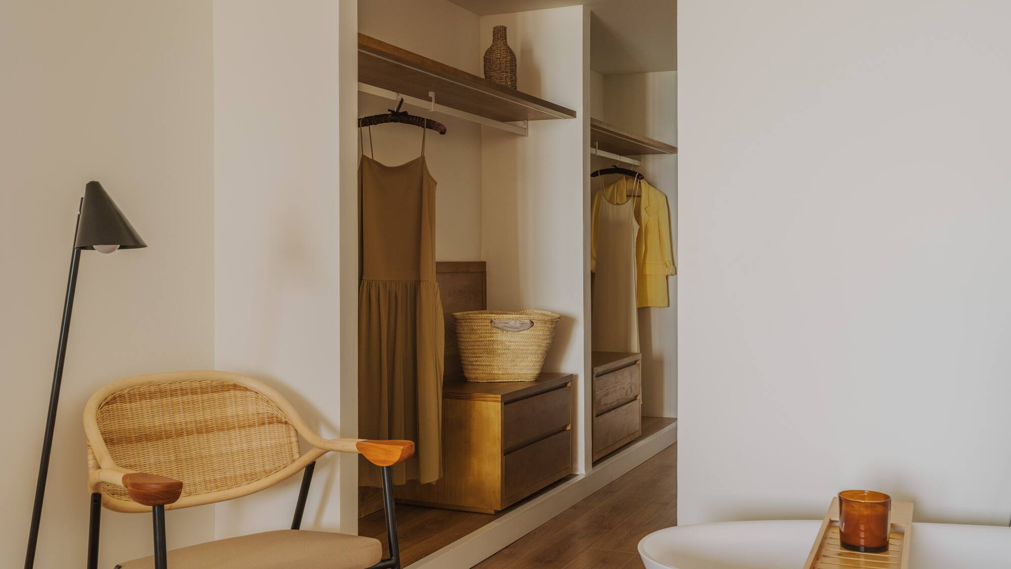 a room with a tub and a chair