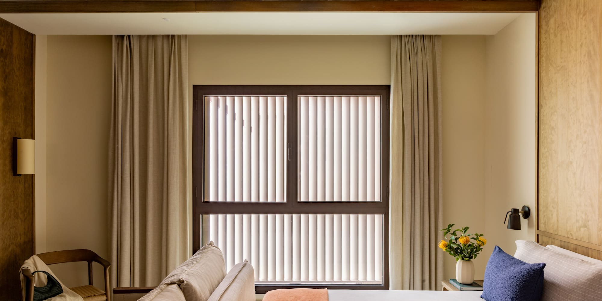 a room with a bed and a window