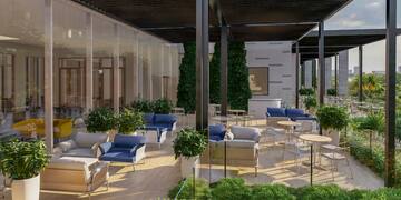 a patio with chairs and tables