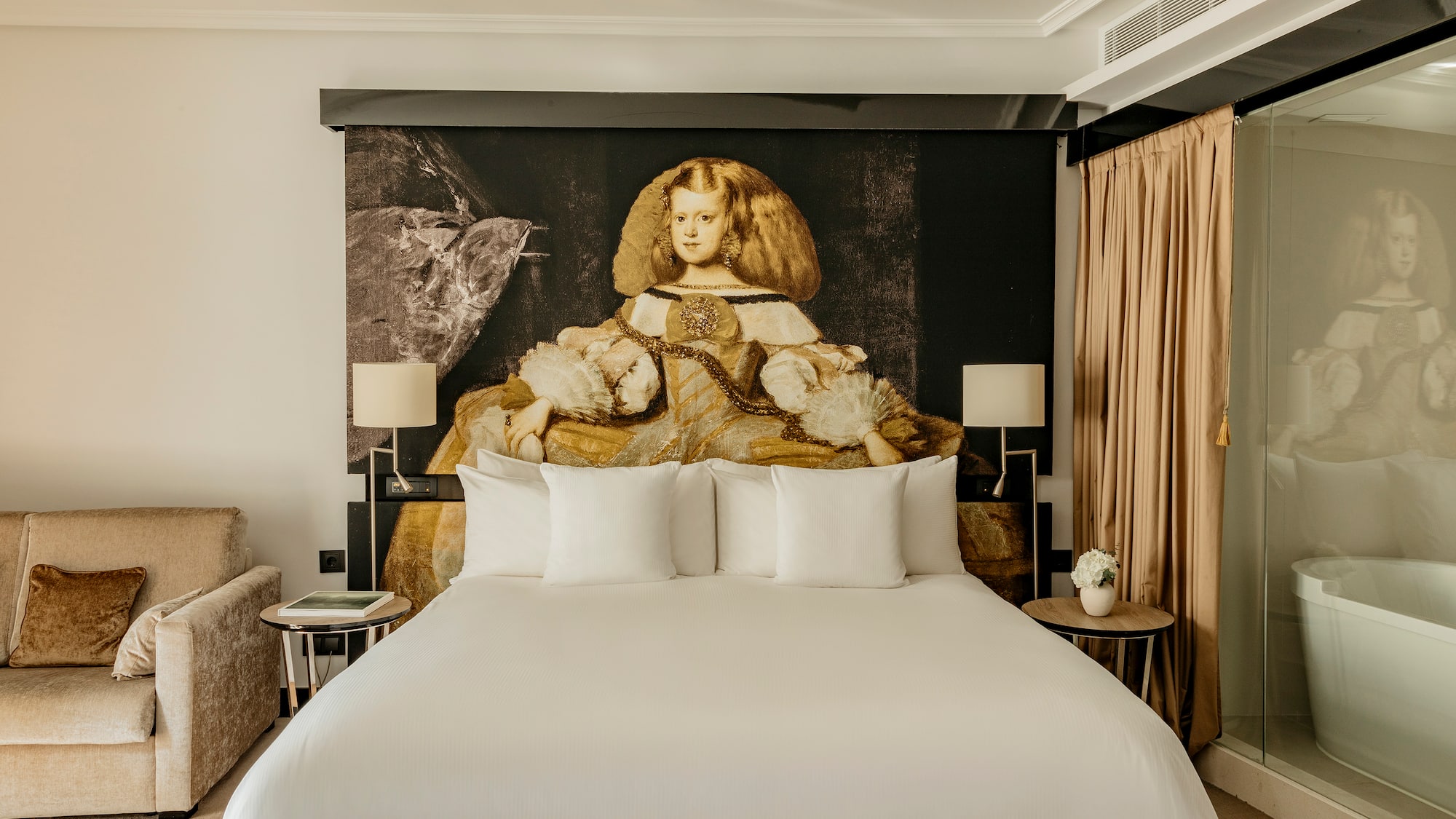 a bed with a large picture of a woman