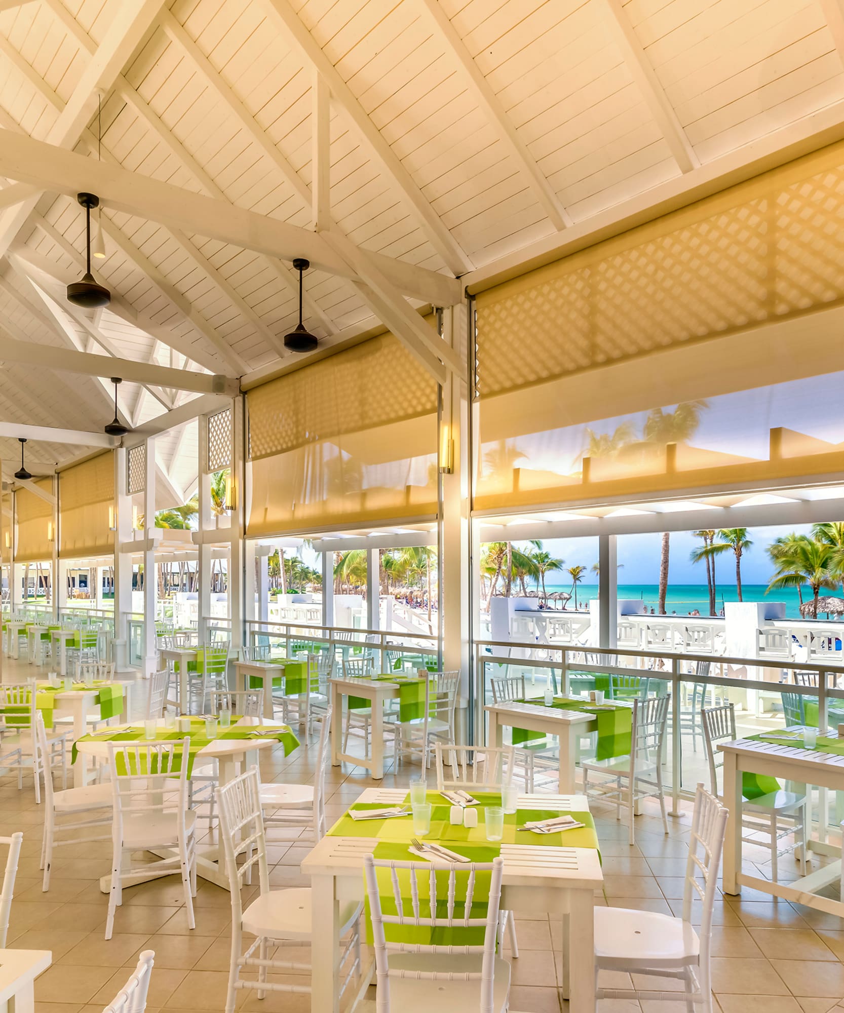 a room with tables and chairs