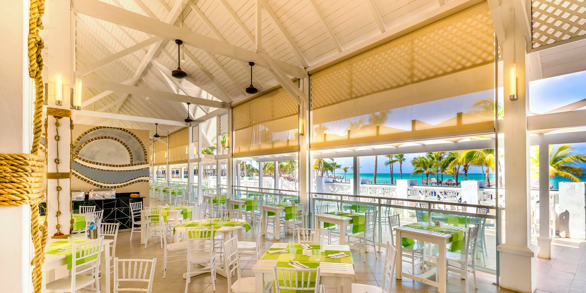 a room with tables and chairs