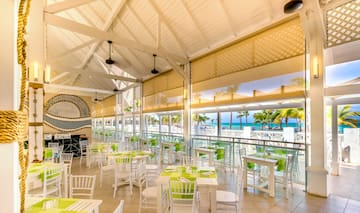 a room with tables and chairs
