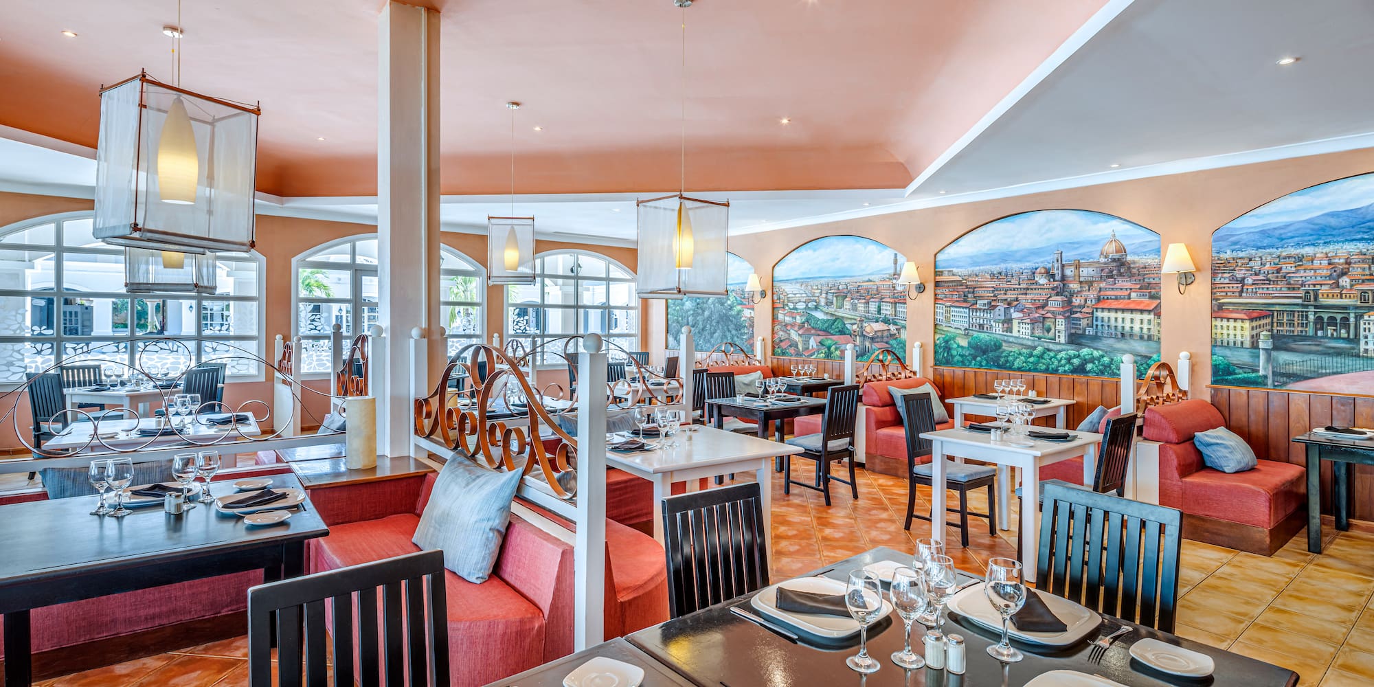 a restaurant with tables and chairs