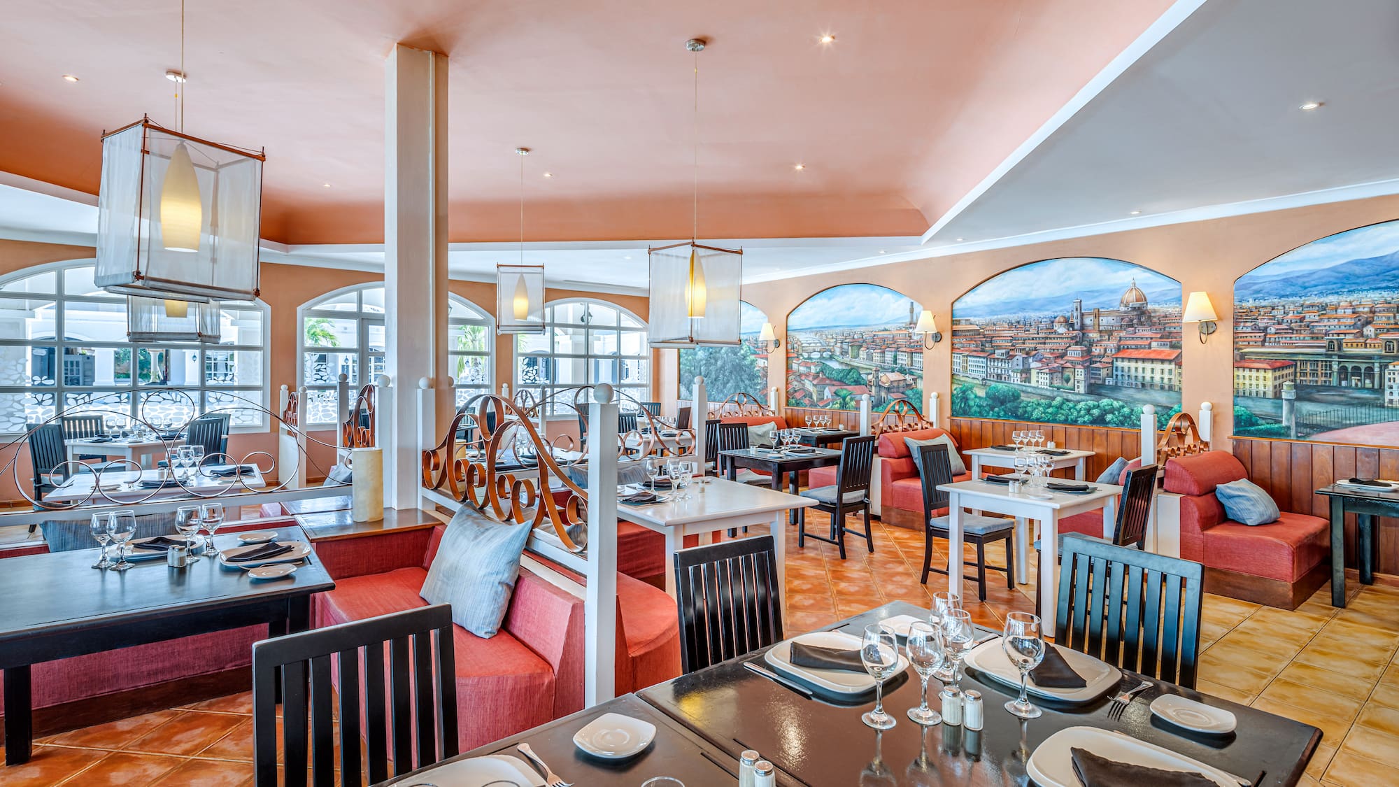 a restaurant with tables and chairs