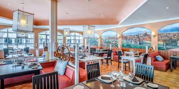 a restaurant with tables and chairs