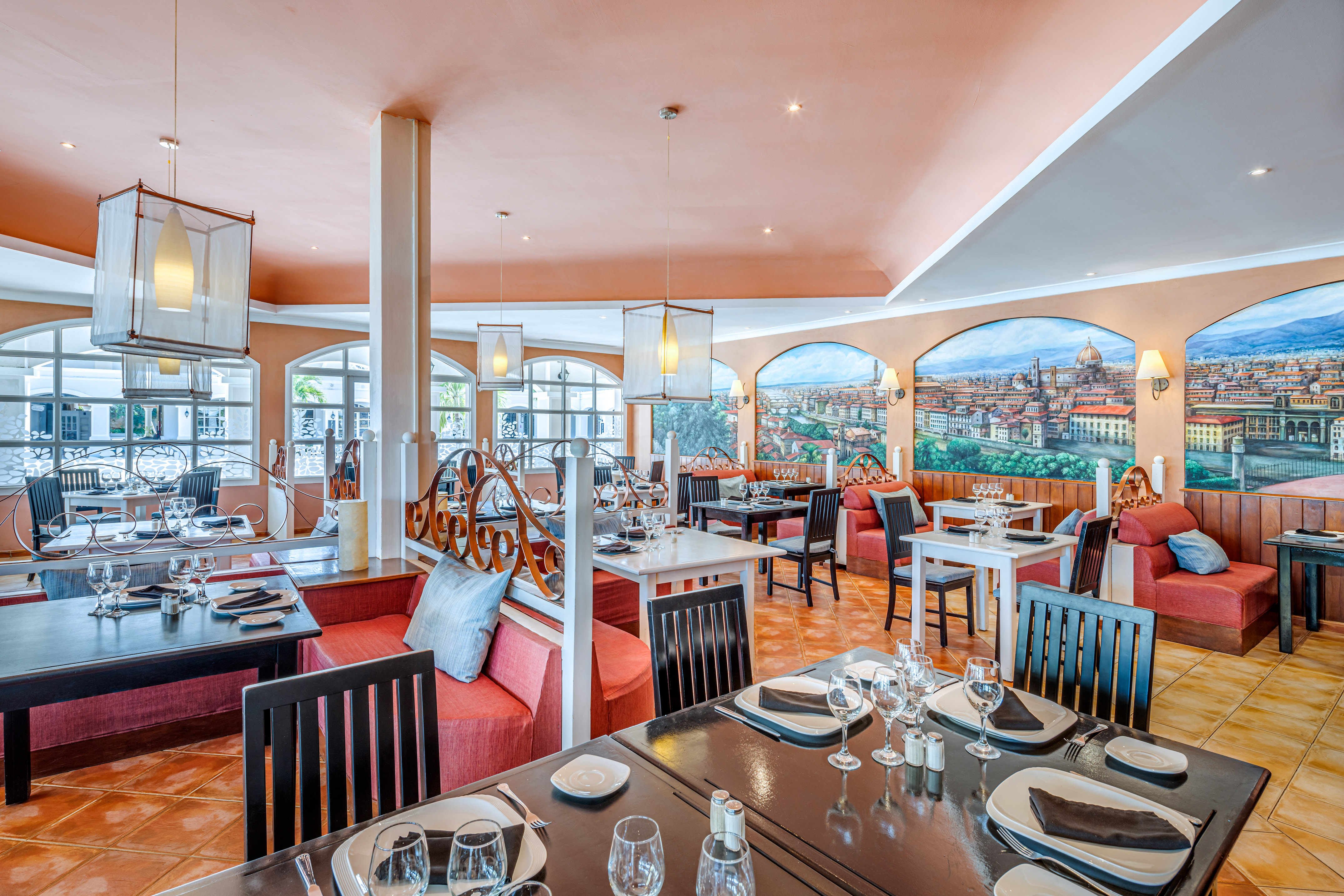 a restaurant with tables and chairs