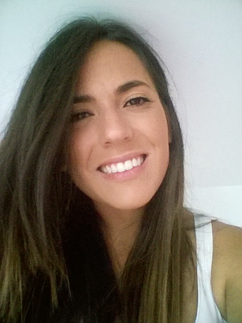 a woman smiling for a selfie