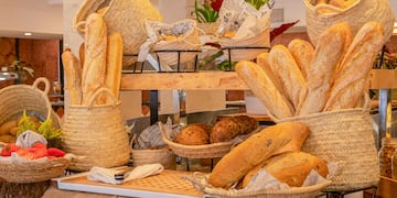 a display of bread and bread in baskets