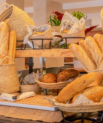 a display of bread and bread in baskets